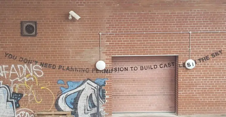 Banksy's You don't need planning permission to build castles in the sky