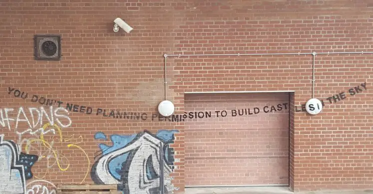 Banksy's You don't need planning permission to build castles in the sky