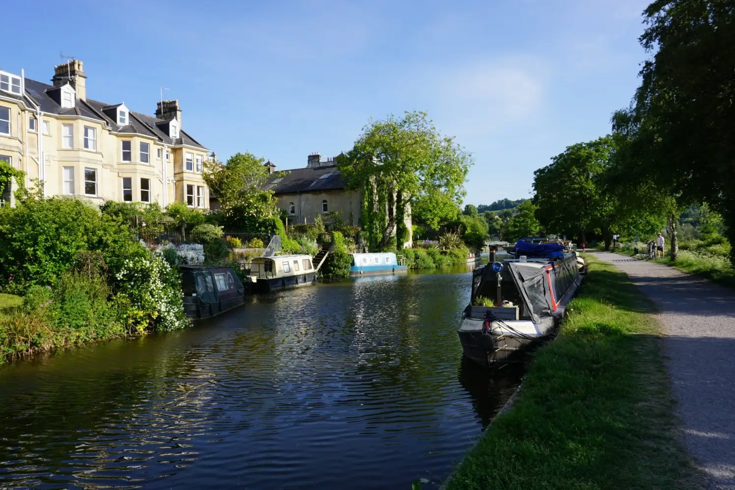 Kennet & Avon canal with canal boats and townhouses, one of Bath's hidden gems