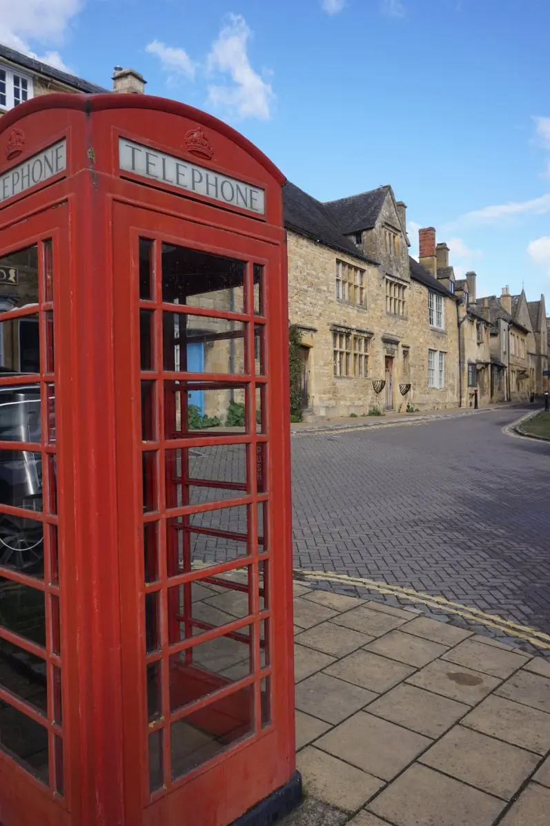 Red telephone box and street in Chipping Campden, North Cotswold village