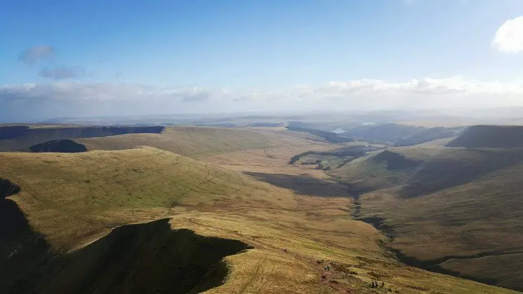 Splendid views from Pen y Fan of the Brecon Beacons mountains and valleys on the Horseshoe Ridge hiking trail