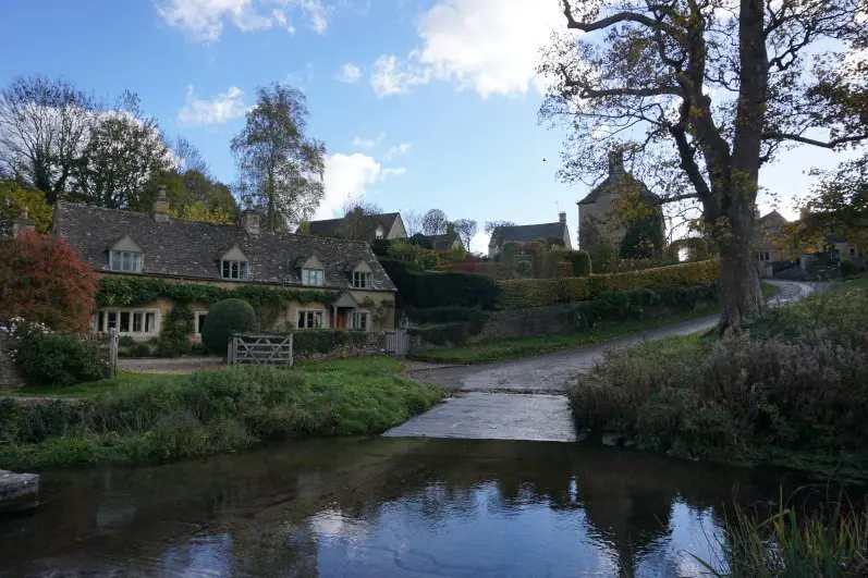 Stream and quaint cottage in Upper Slaughter, Cotswold village