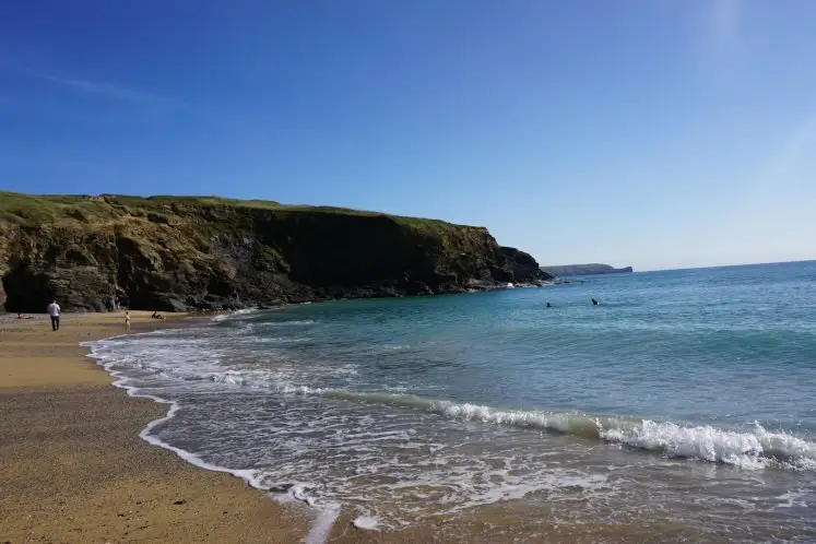 Beach and Rugged Cliff of Church Cove in Cornwall