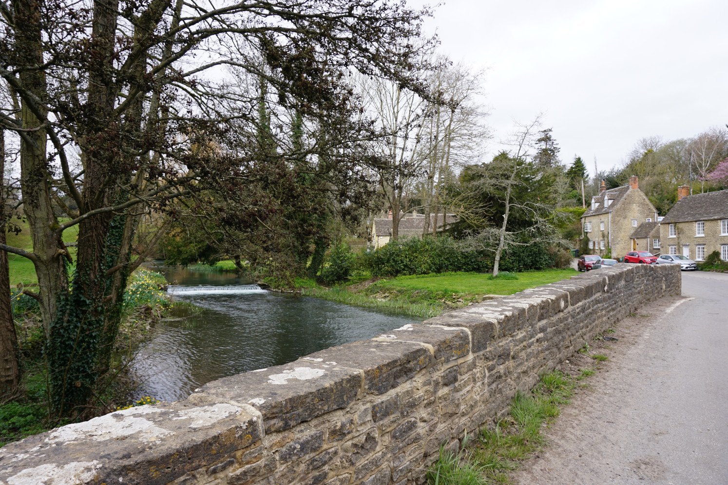 River Avon flowing through Easton Grey on the Cotswold walk from Sherston