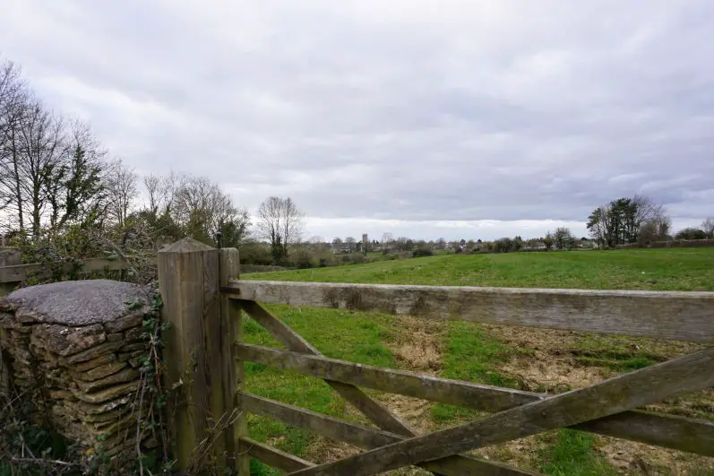 Views of Sherston across a field in the Cotswolds