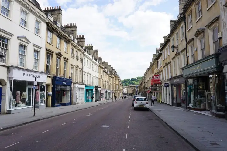 Bath's Milsom shopping street with striking buildings and shops
