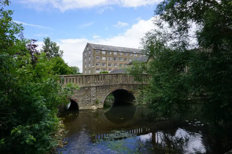 The imposing Avon Mill and the River Avon in Malmesbury