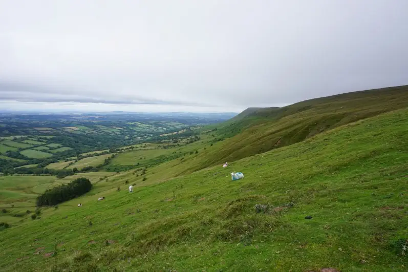 Views of Black Hill and the Herefordshire countryside in the Brecon Beacons