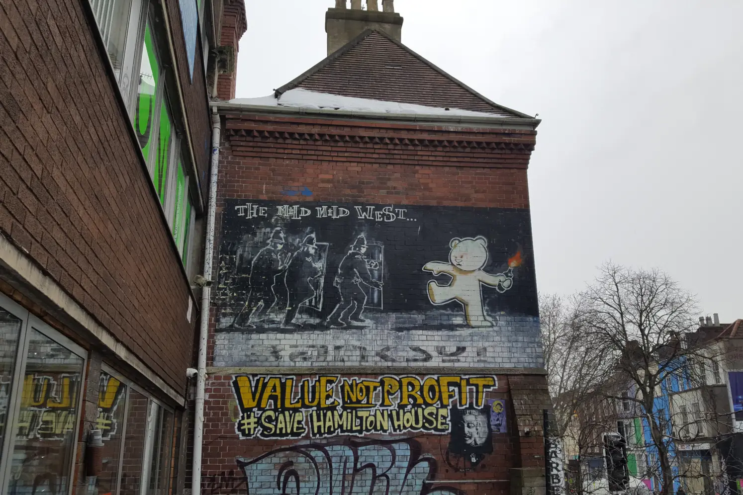 Banksy graffiti in Stokes Croft, Bristol Mild Mild West