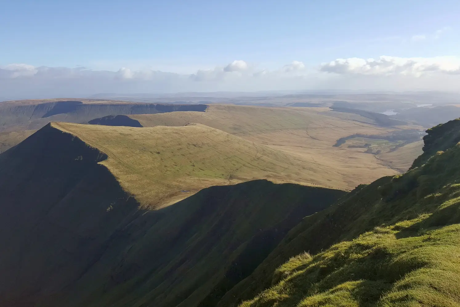 View from Pen y Fan of the Brecon Beacons mountains on the Horseshoe Ridge hike