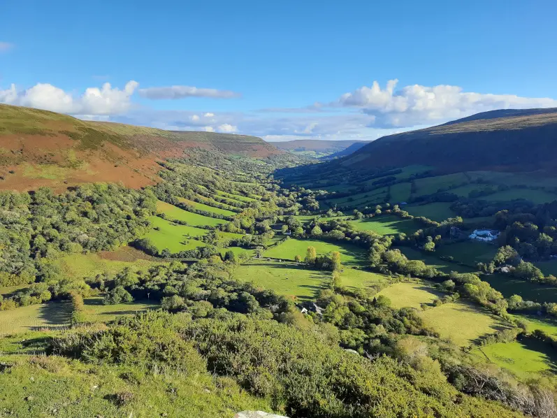 The enchanting valley of Ewyas and the quaint village of Capel-y-ffin from the Darren Llywd ridge