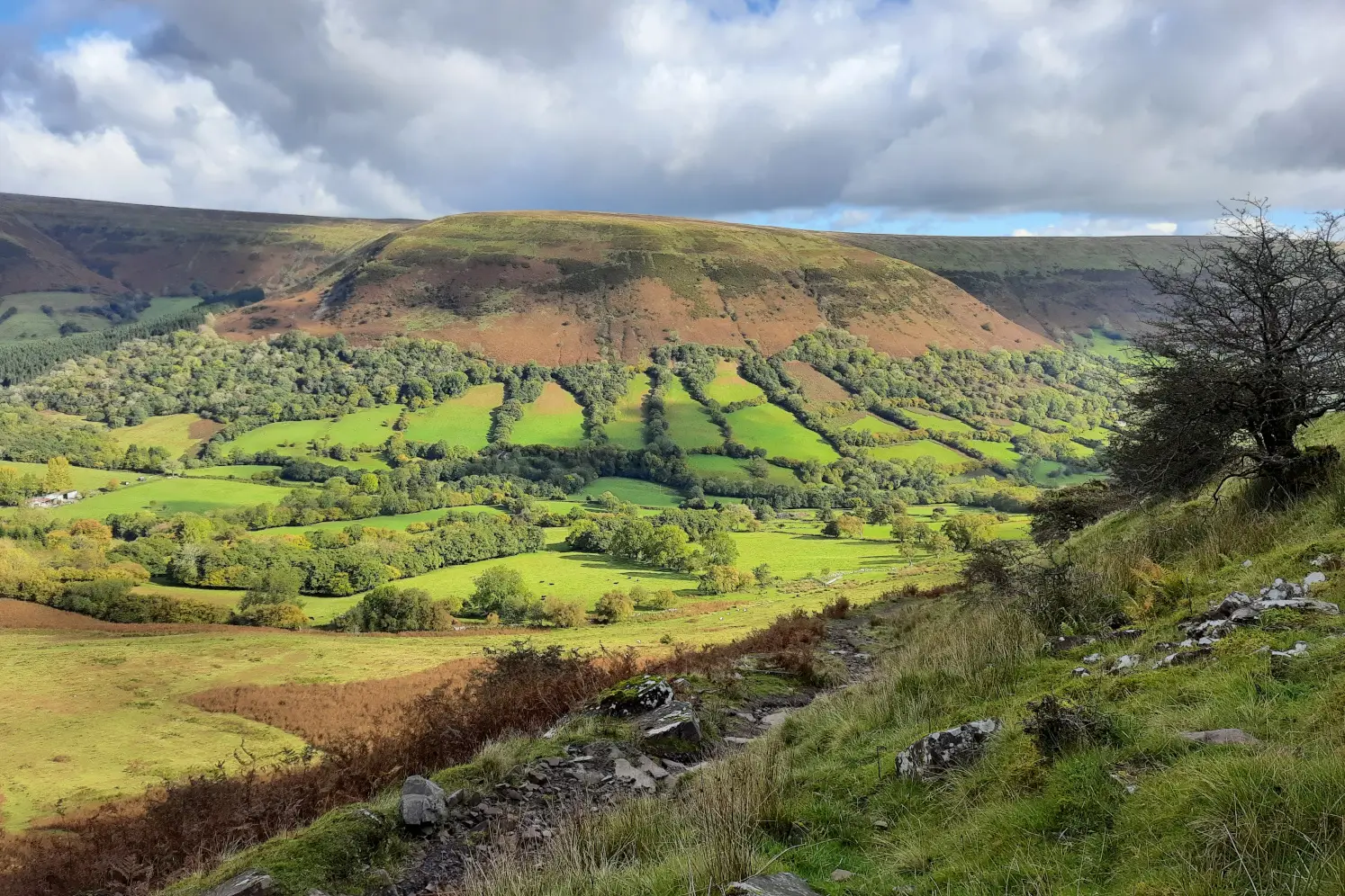 Views of the Ewyas Valley and Brecon Beacon mountains on the Capel-y-ffin to Rhos Dirion and Twmpa hike