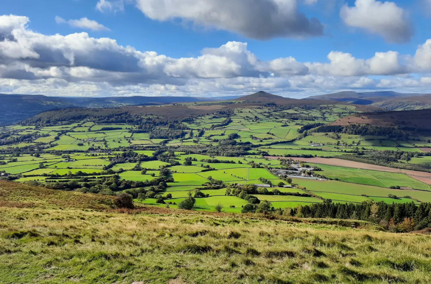 Views of Sugar Loaf and the Brecon Beacon mountains from the Skirrid Mountain