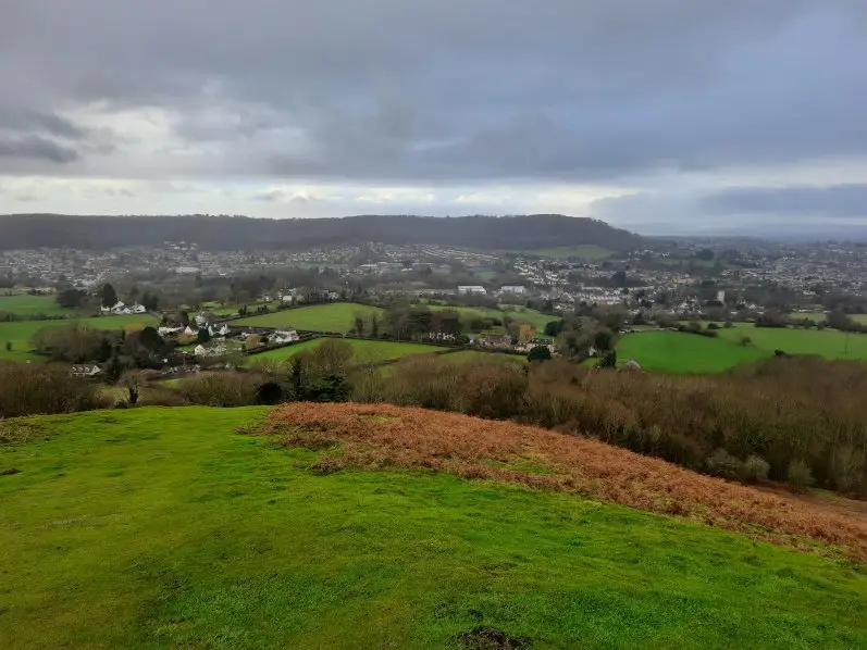 Views of the Cotswold hills and the town of Dursley from Cam Peak and Cam Long Down